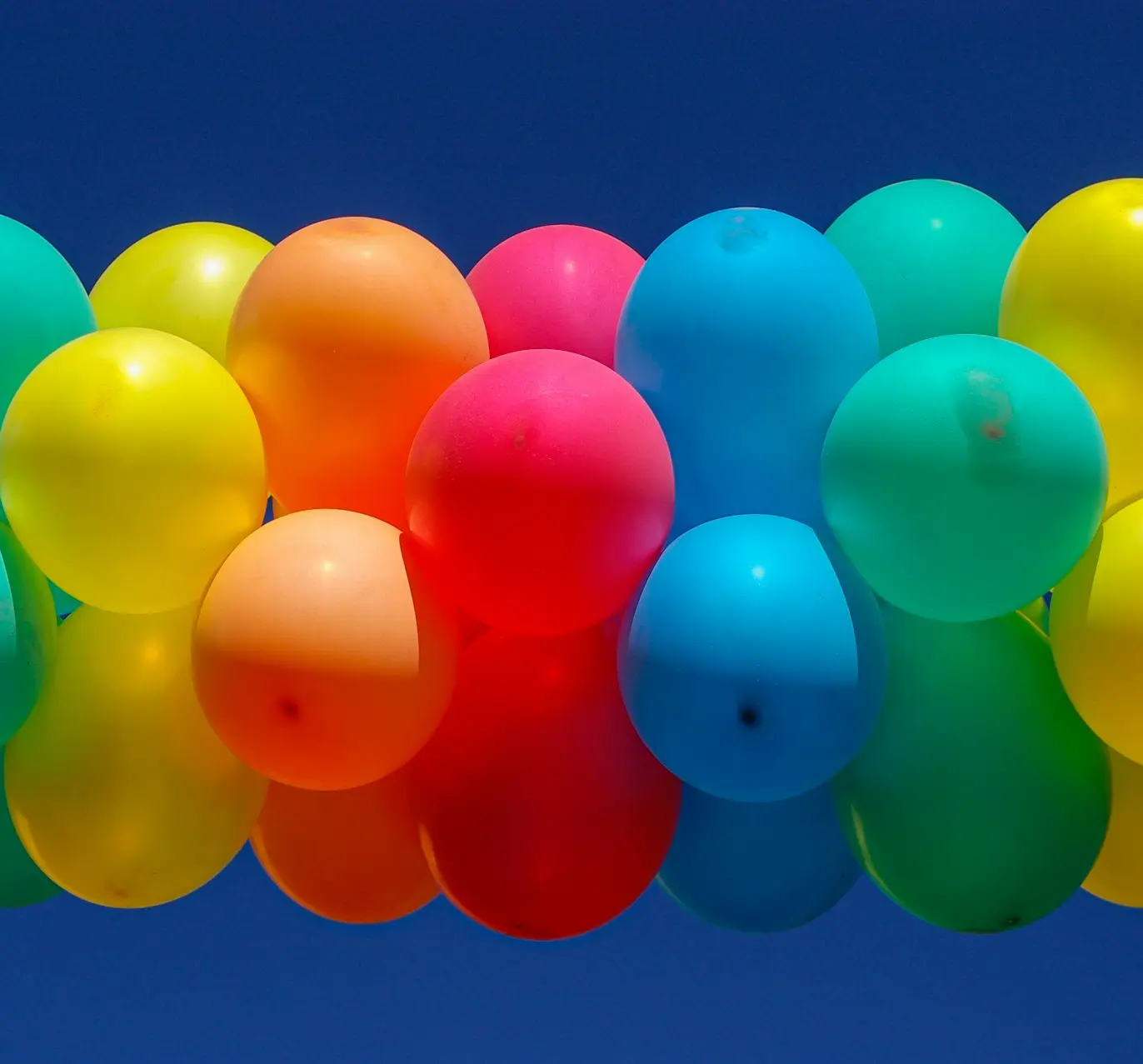 blue pink yellow and green balloons